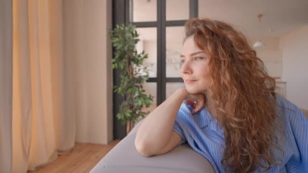 Successful Woman Enjoy Day Home Sitting Couch Looking Window Dreaming — Stockvideo