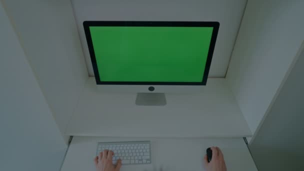 View Man Sitting Desk Working Typing Keyboard Computer Green Screen — Wideo stockowe