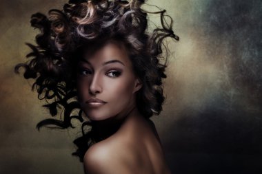Beautiful  young woman beauty shot with hair in motion clipart