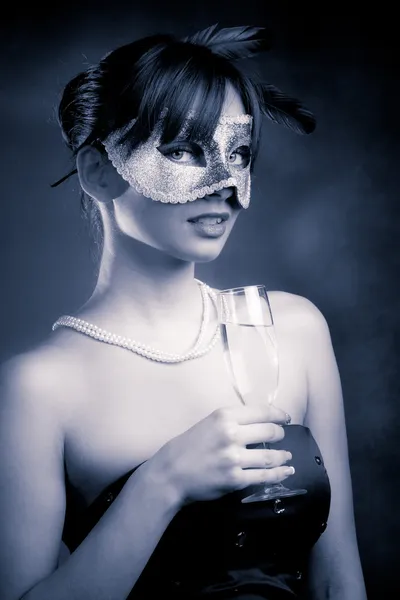 Mask and champagne Stock Picture