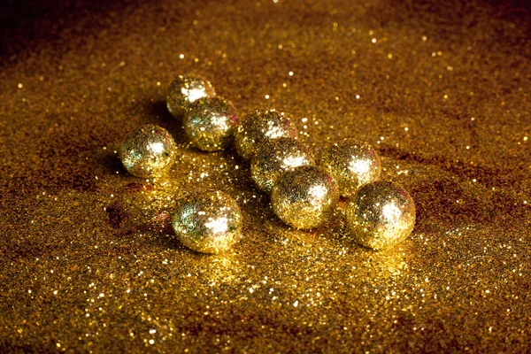 Złote kule musujące — Zdjęcie stockowe