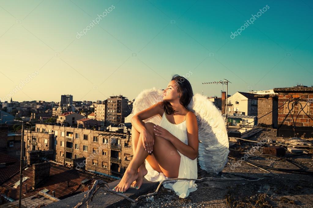 http://st.depositphotos.com/1016026/3010/i/950/depositphotos_30100237-angel-on-the-roof.jpg