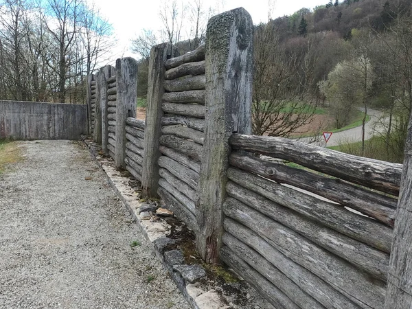 old wooden fence in the forest