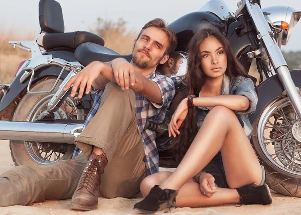 Happy young love couple on scooter enjoying themselves on trip — Stock Photo, Image