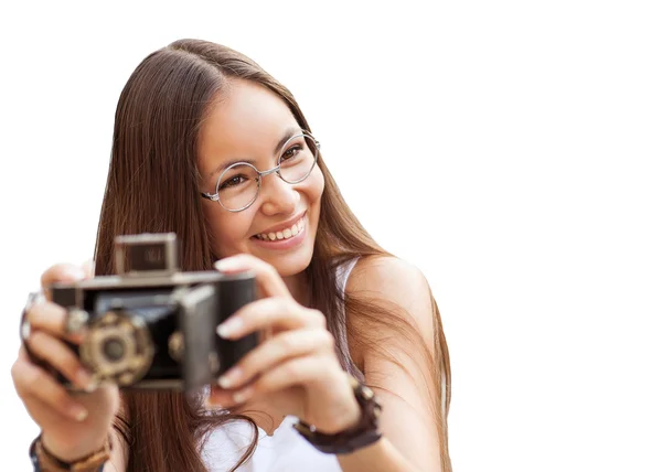 Young woman holding an old vintage camera — Stock Photo, Image