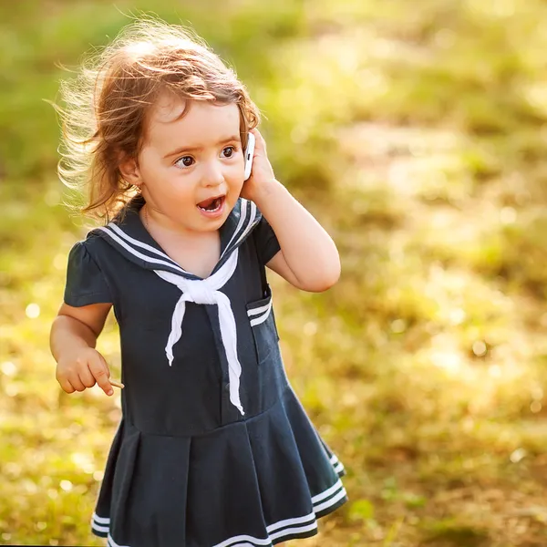 Cute little girl talking — Stock Photo, Image