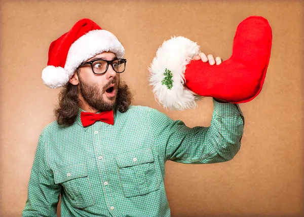 Santa Claus con los calcetines de los regalos — Foto de Stock