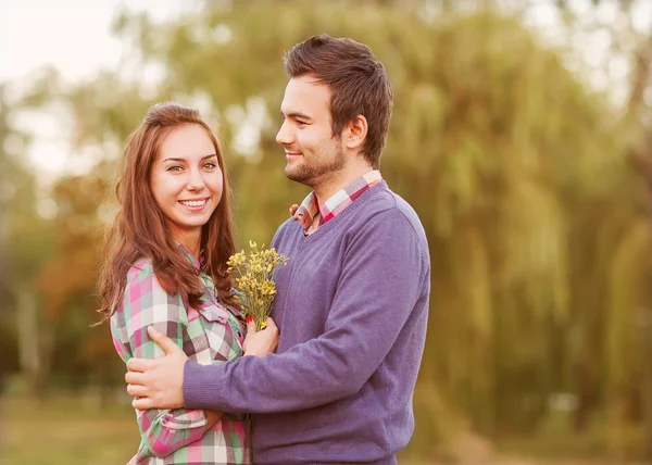 Young couple in love outdoor — Stock Photo, Image