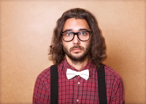 Emotional Portrait of young man isolated over background — Stock Photo, Image