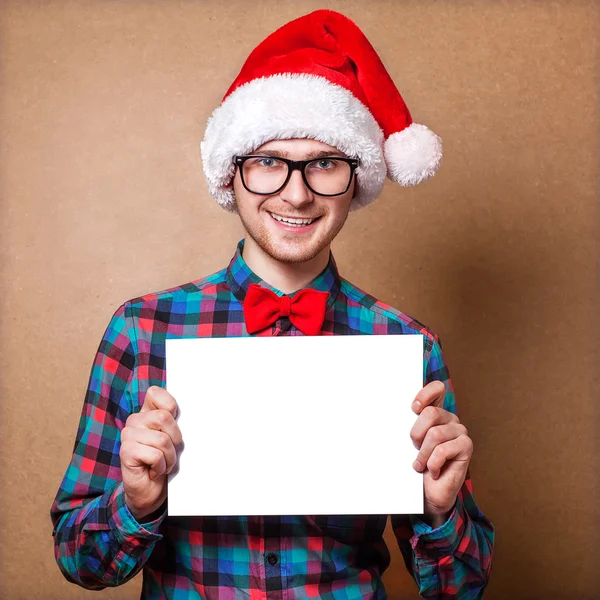 Hipster jultomten pekar i vita tomma tecken med leende — Stockfoto