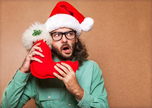 Homem bonito vestido de Papai Noel — Fotografia de Stock