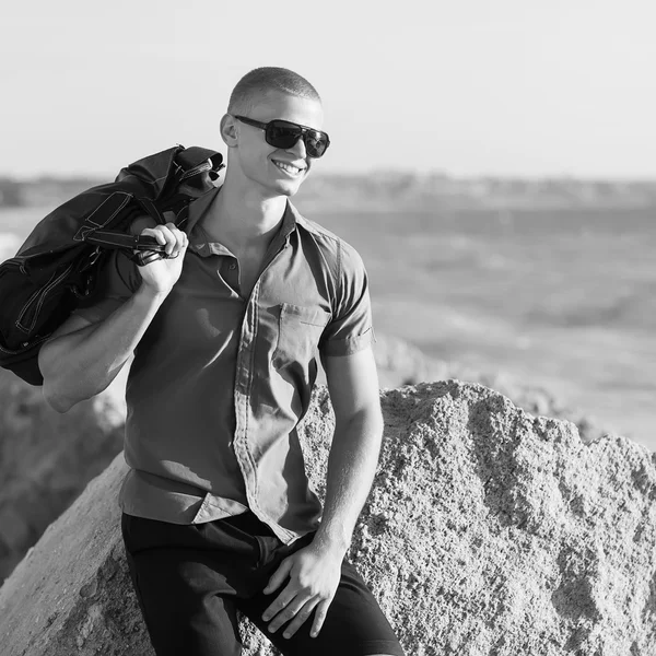 Trendy perfect body guy posing on the beach — Stock Photo, Image