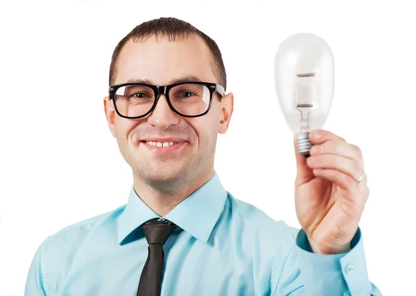 Businessman holding lamp — Stock Photo, Image