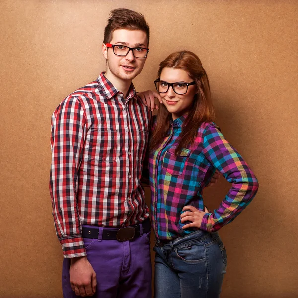 Couple of guys dressed in clothes hipsters are in the studio — Stock Photo, Image