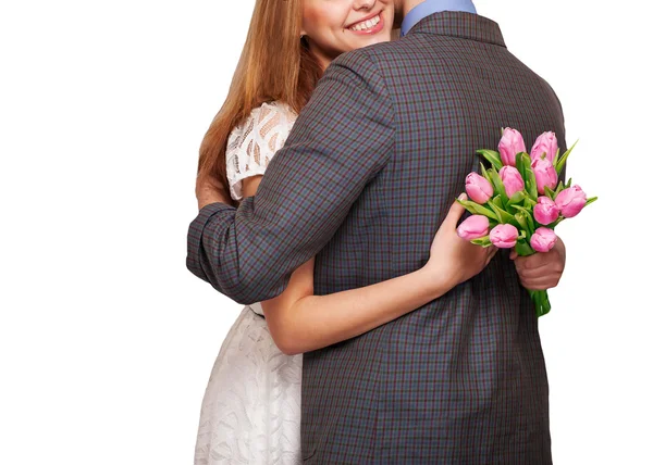 Jong paar in liefde met een boeket van tulpen. het concept van — Stockfoto