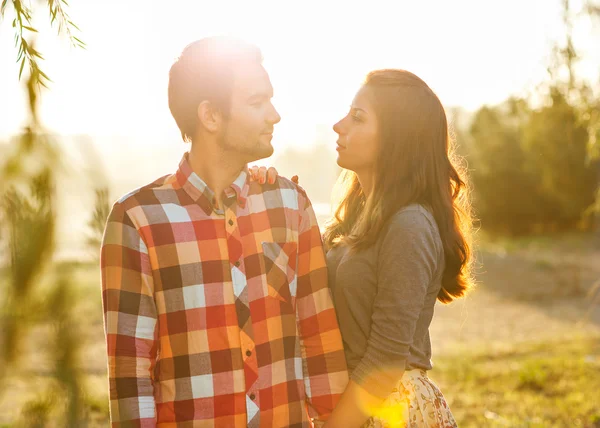 Young couple in love walking in the park — Stock Photo, Image