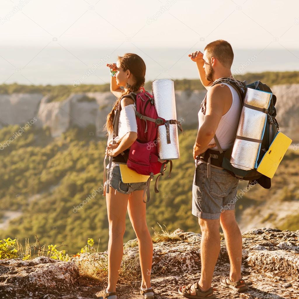 Hikers - people hiking, man looking at mountain nature landscape