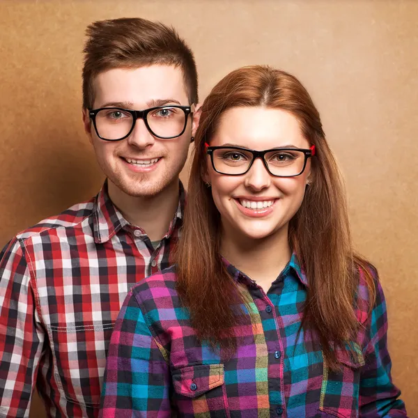 Couple of guys dressed in clothes hipsters are in the studio — Stock Photo, Image