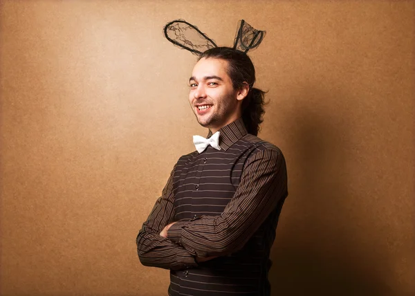 Fashion guy in bunny ears — Stock Photo, Image