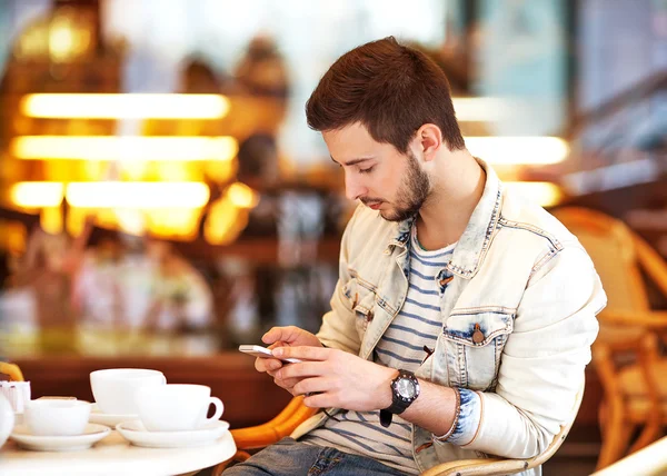 Young fashion man with beard drinking espresso coffee — Stock Photo, Image