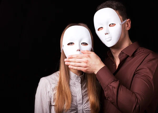 Fashion Happy Couple in Love holding with mask face. — Stock Photo, Image