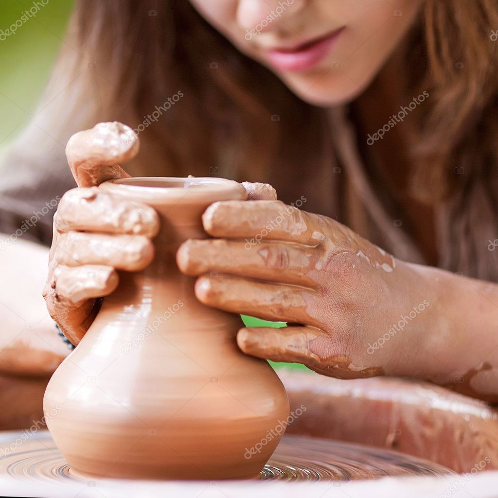 Hands working on pottery wheel Stock Photo by ©osons163 48070877