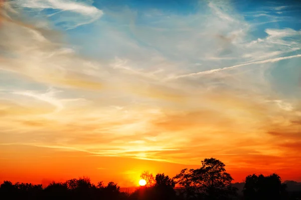 Sky, Bright Blue, Orange and Yellow Colors Sunset. Instant Photo — стокове фото