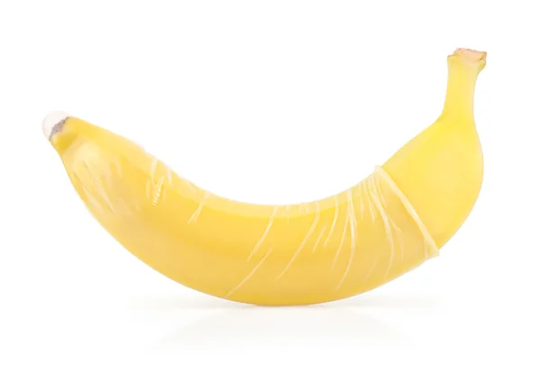 Gelbe Banane mit Kondom — Stockfoto