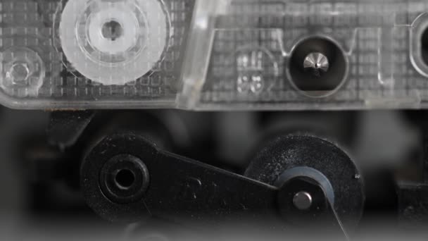 Vintage compact audio cassette playing. extreme close-up footage — Stock Video