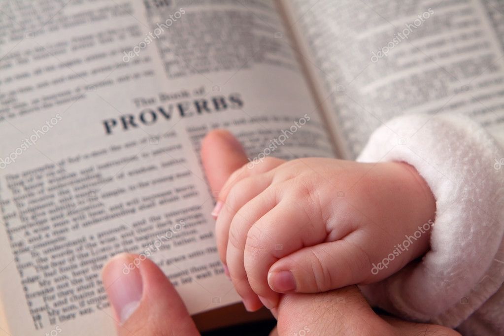 Baby Holding Dad Finger On Bible Stock Photo By C Balazs Baby Holding Dad Finger On Bible Stock Photo By C Balazs