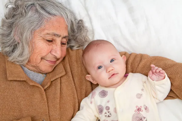 Great Grandma Laying Down With Baby — Stock Photo, Image