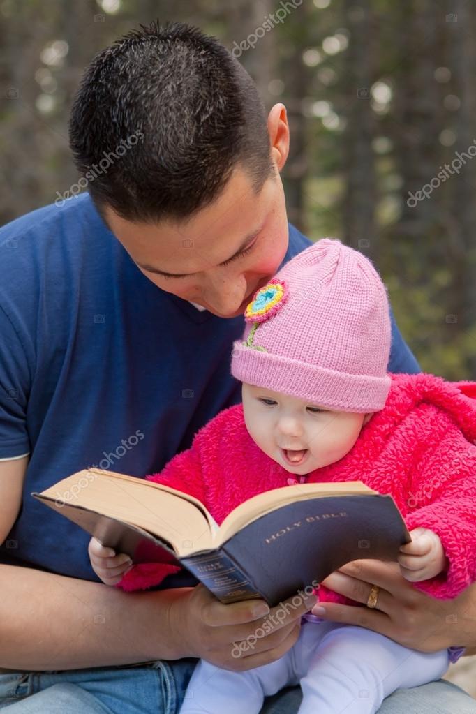 Dad And Baby Daughter Reading Bible Stock Photo By C Balazs