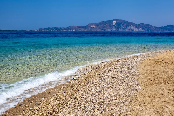 Piaszczystej plaży, morze Grecja — Zdjęcie stockowe