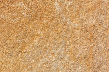 kahverengi duvar dokusu ile küçük kayalar