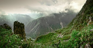 Colca Canyon in Peru - the deepest in the world clipart