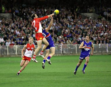 MELBOURNE - SEPTEMBER 12: Tadhg Kennelly spoils in the AFL second semi final clipart