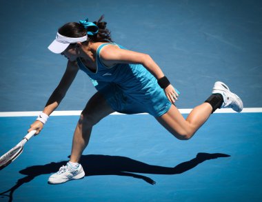 Melbourne, Avustralya - 26 Ocak: jie zheng ona çeyrek final kazanmak maria kirilenko üzerinde eylem sırasında 2010 Avustralya Açık