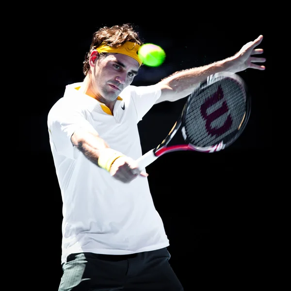 Melbourne - 25 januari: Roger Federer i Schweiz i sin kvartsfinal seger över Stanislas Wawrinka i Schweiz i 2011 Australian Open — Stockfoto