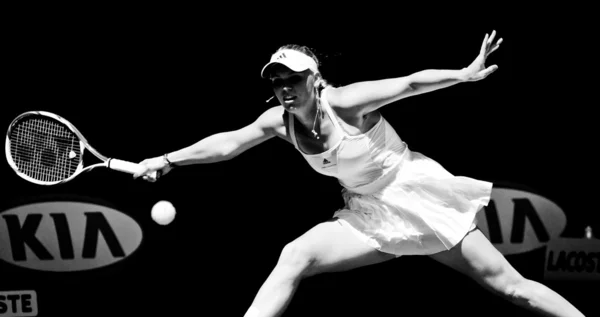 在 Anastasija Sevastova 的拉脱维亚在 2011年澳大利亚网球公开赛她第四轮战胜丹麦的卡罗琳沃斯尼亚基墨尔本-1 月 23 日: — 图库照片