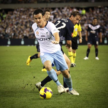 Melbourne - 20 Mart: Mark Köprüsü (R), Sydney Fc Kev çalışır