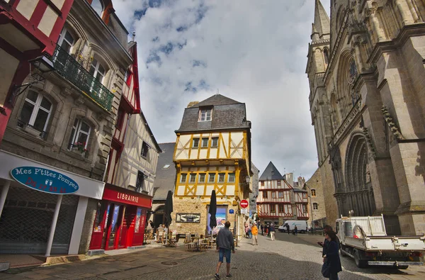 Vannes, France - May 25, 2022: Colorful old wooden houses and St. Peter\'s Basilica in the historical center of Vannes, coastal medieveal town in Morbihan departement, Brittany, France