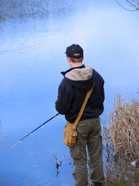 Young angler fishing — Stock Photo, Image