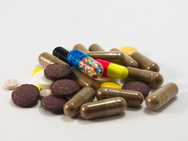 Drugs out of the capsule clipart