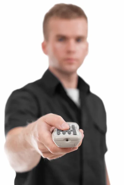 Male model holding remote control. — Stock Photo, Image