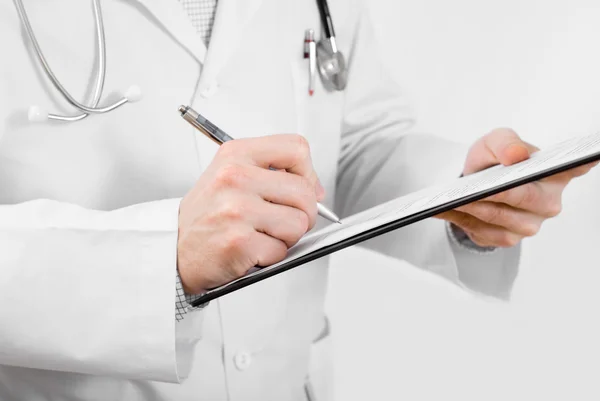 Doctor with clipboard — Stock Photo, Image