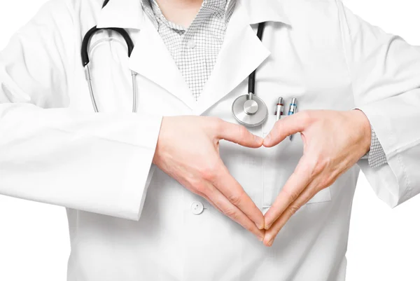 Young doctor with heart shaped hands on white background — Stock Photo, Image