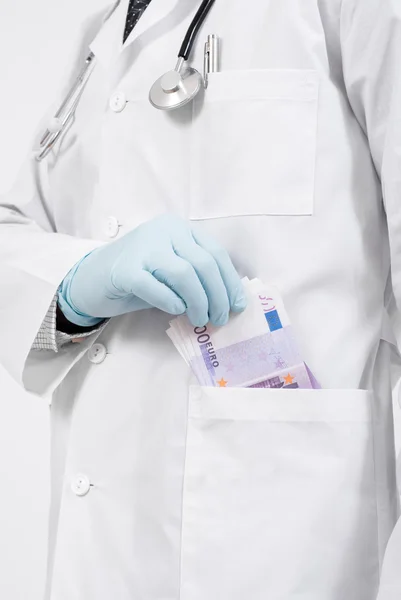 Arzt und Geld für die Operation — Stockfoto
