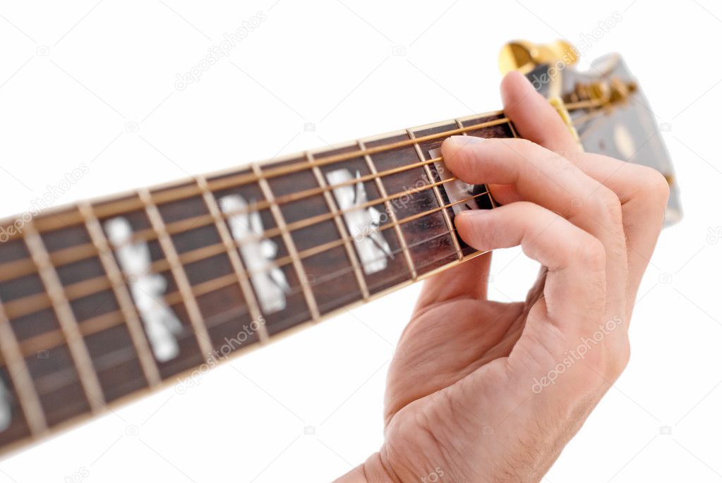 Hand playing guitar.