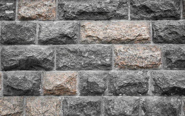 Stone wall from a granite — Stock Photo, Image