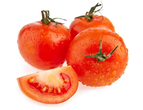 Tomatoes in drops — Stock Photo, Image